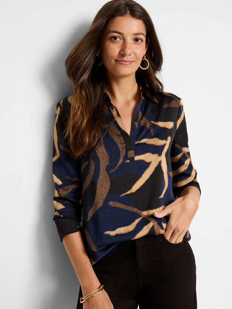 Navy, black, and tan abstract leaf print blouse.  Three-quarter sleeves, collared neckline.