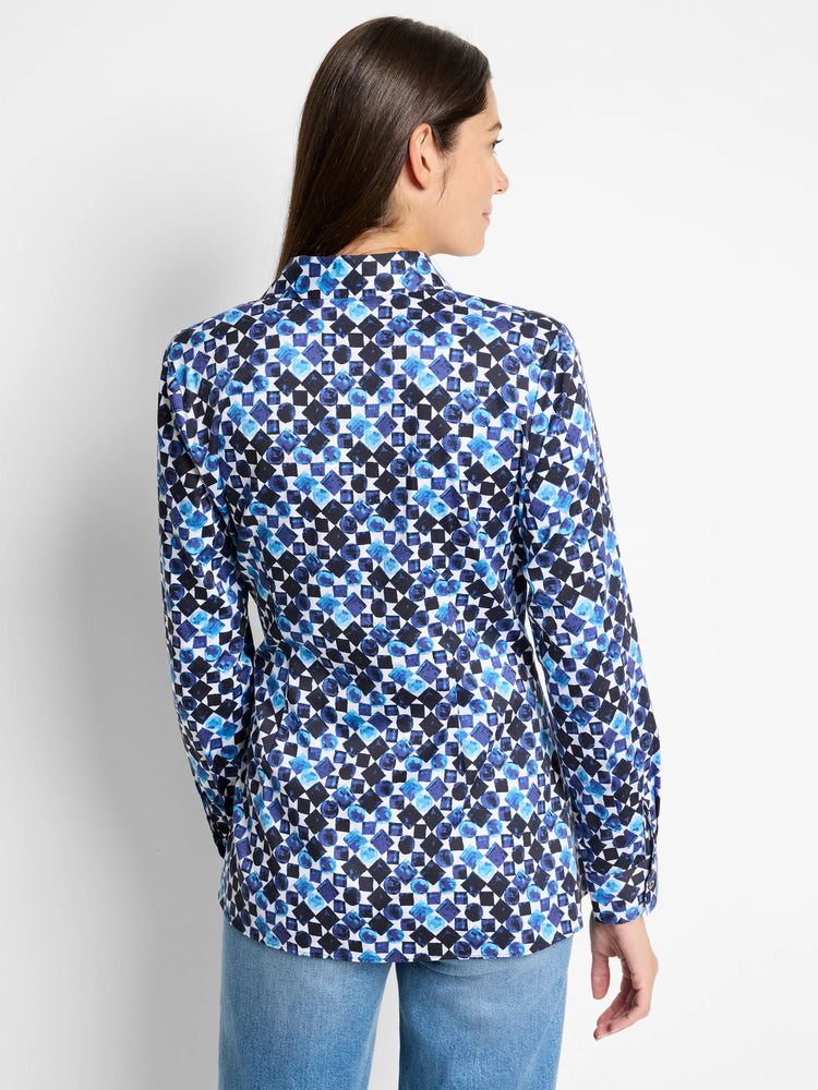 Blue and black abstract print long-sleeve shirt with side tie.  White background.