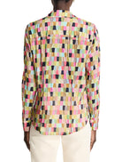 Cotton shirt; multicolored patchwork pattern in pinks, greens, beige, and dark blues; crinkled texture.