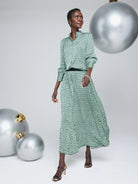 Green and black abstract dot pleated maxi skirt.