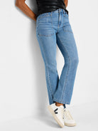 Light wash blue denim jeans; flared leg,  two front pockets.