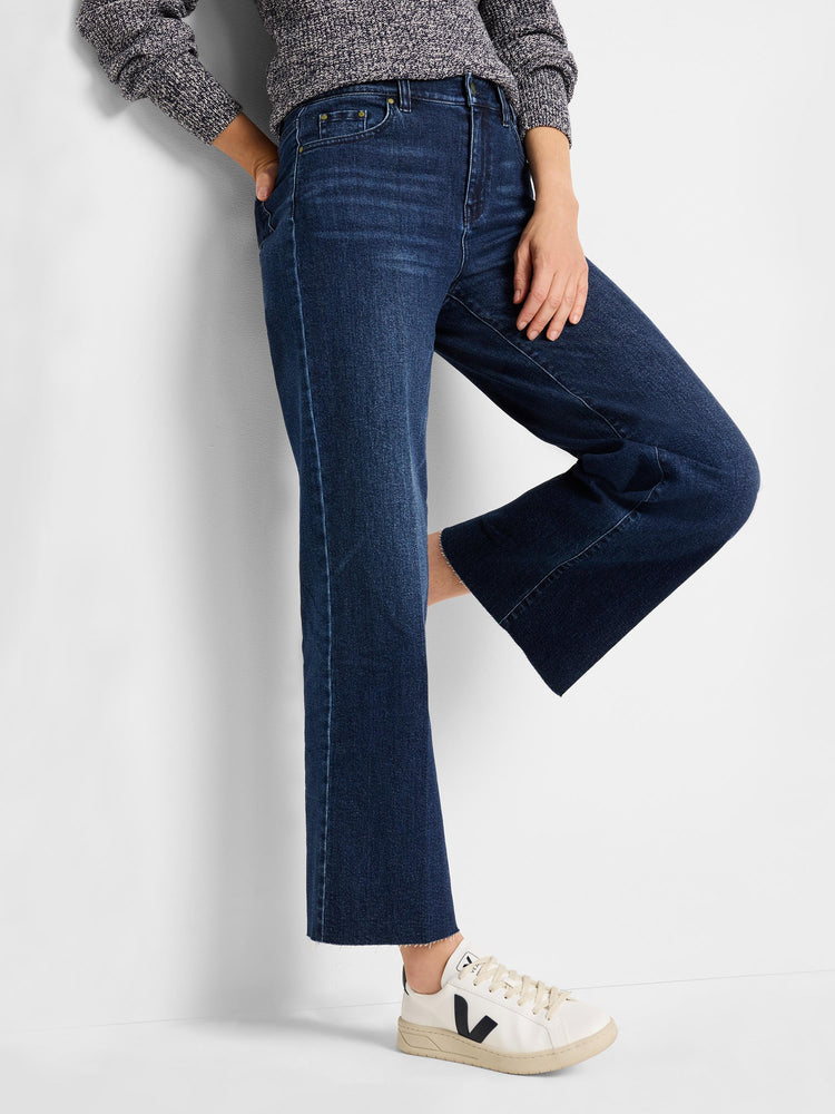 Dark wash, high-waisted wide leg jeans with a cropped, raw hem.