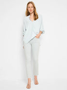 Pale blue, light wash straight ankle jeans.
