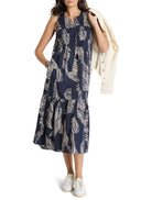 Midi dress, sleeveless, dark blue background with tan zebra stripes.  Tiered skirt.