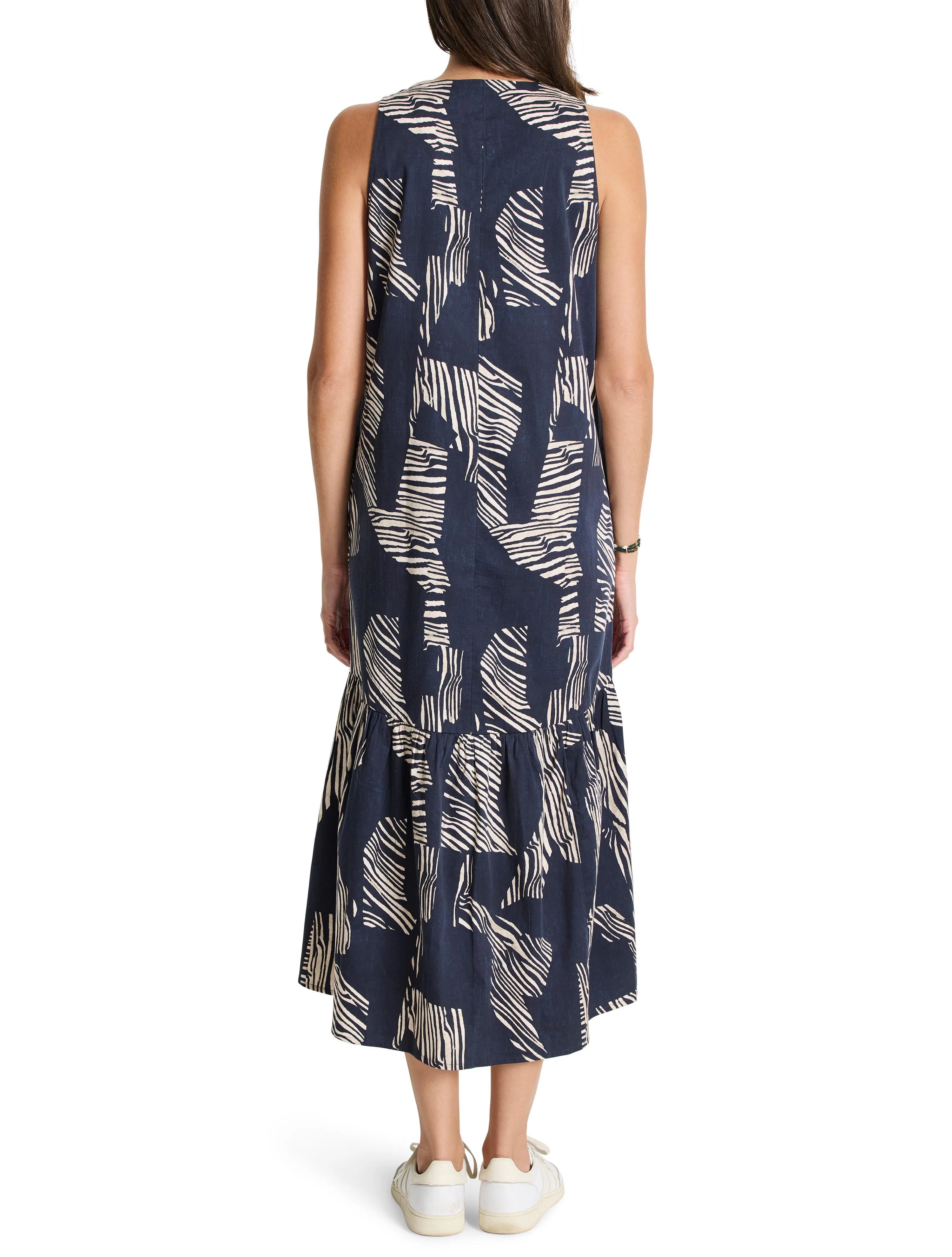Navy midi dress with off-white zebra stripes. Sleeveless, tiered skirt.