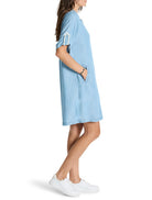 Light blue denim dress, short sleeves with white trim, and pockets.