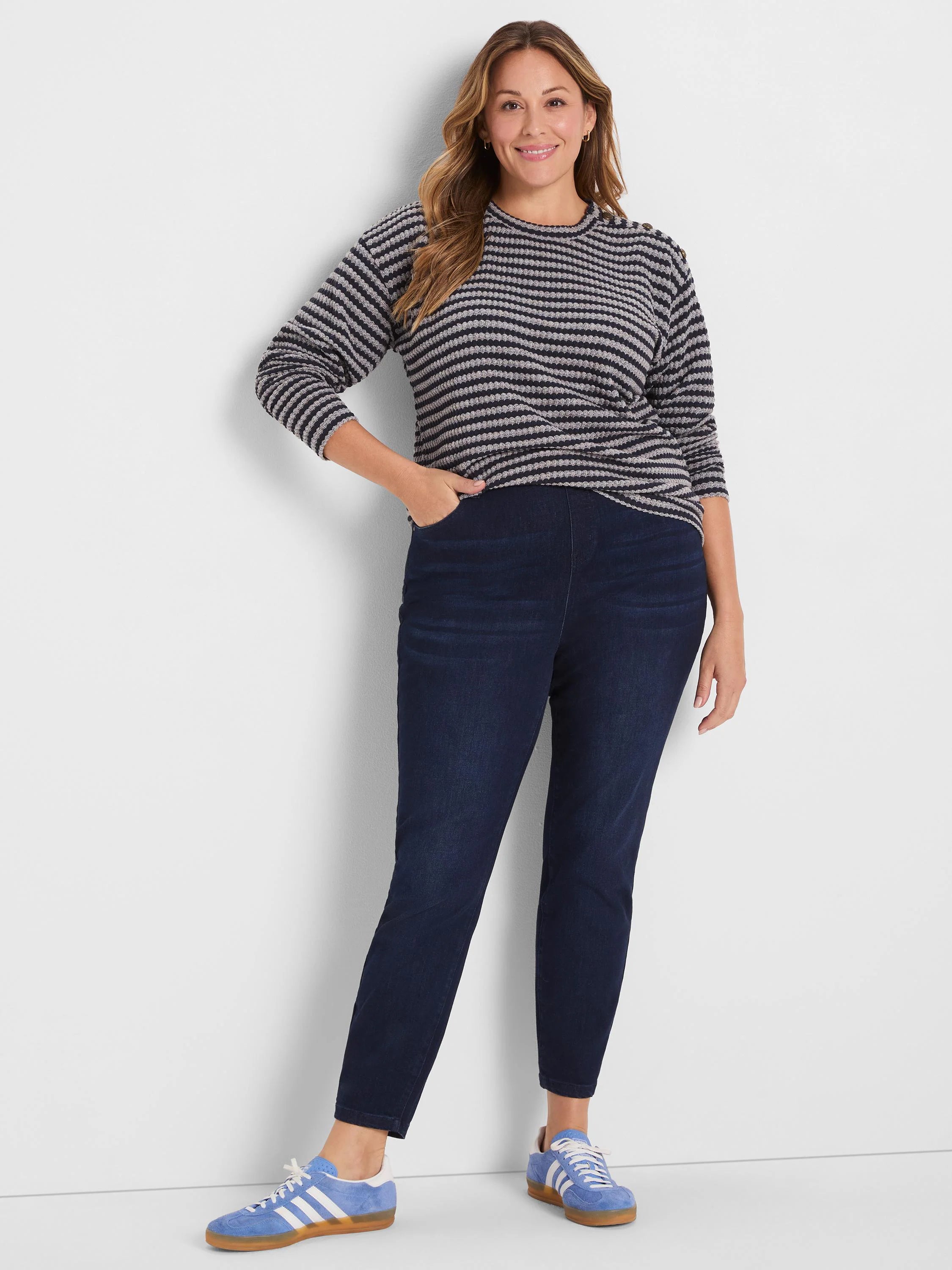 Navy and light grey textured stripe top with 3/4 sleeves and decorative buttons on the wearer's right shoulder.