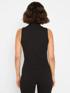 Black ribbed knit sleeveless turtleneck tank.