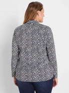 Navy and white Geo Toss patterned knit top, long sleeves. Back view.