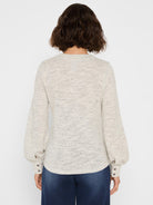 Light gray nep knit top with subtle sparkle and horizontal texture. Features balloon sleeves with two-button cuffs.