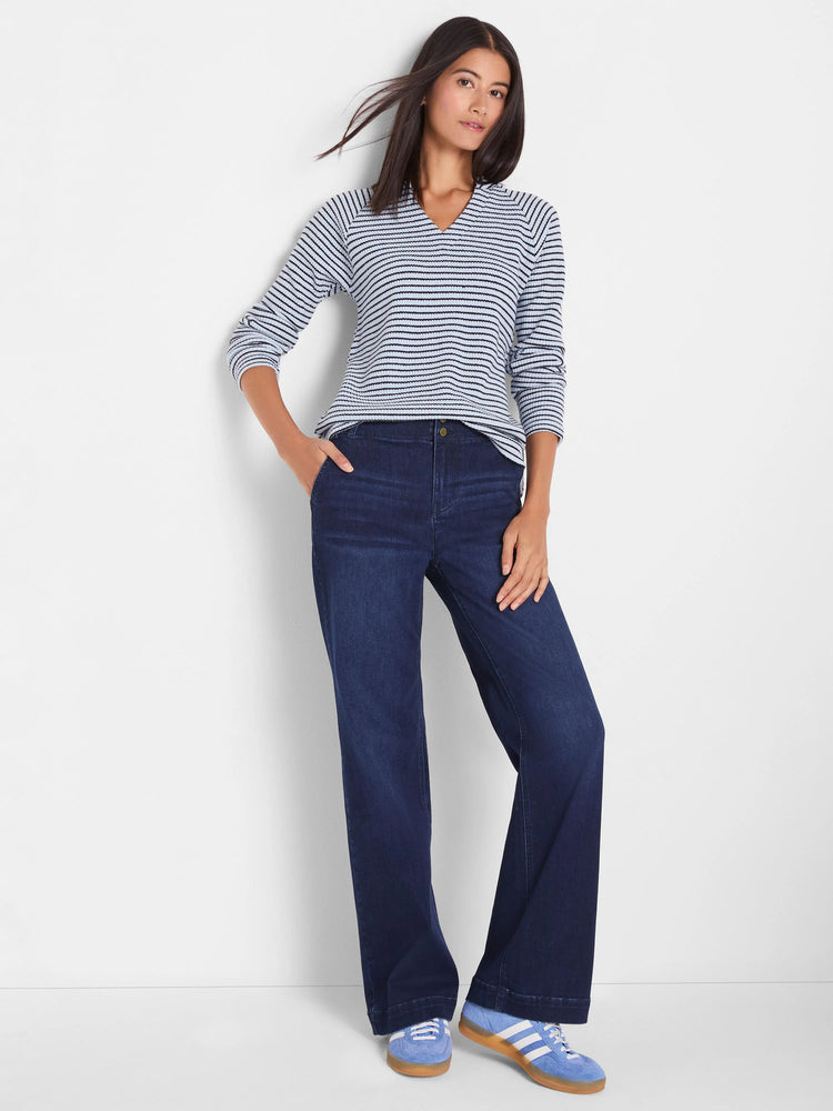 Light blue thermal knit top with thin navy horizontal stripes, long sleeves, and a V-neck.