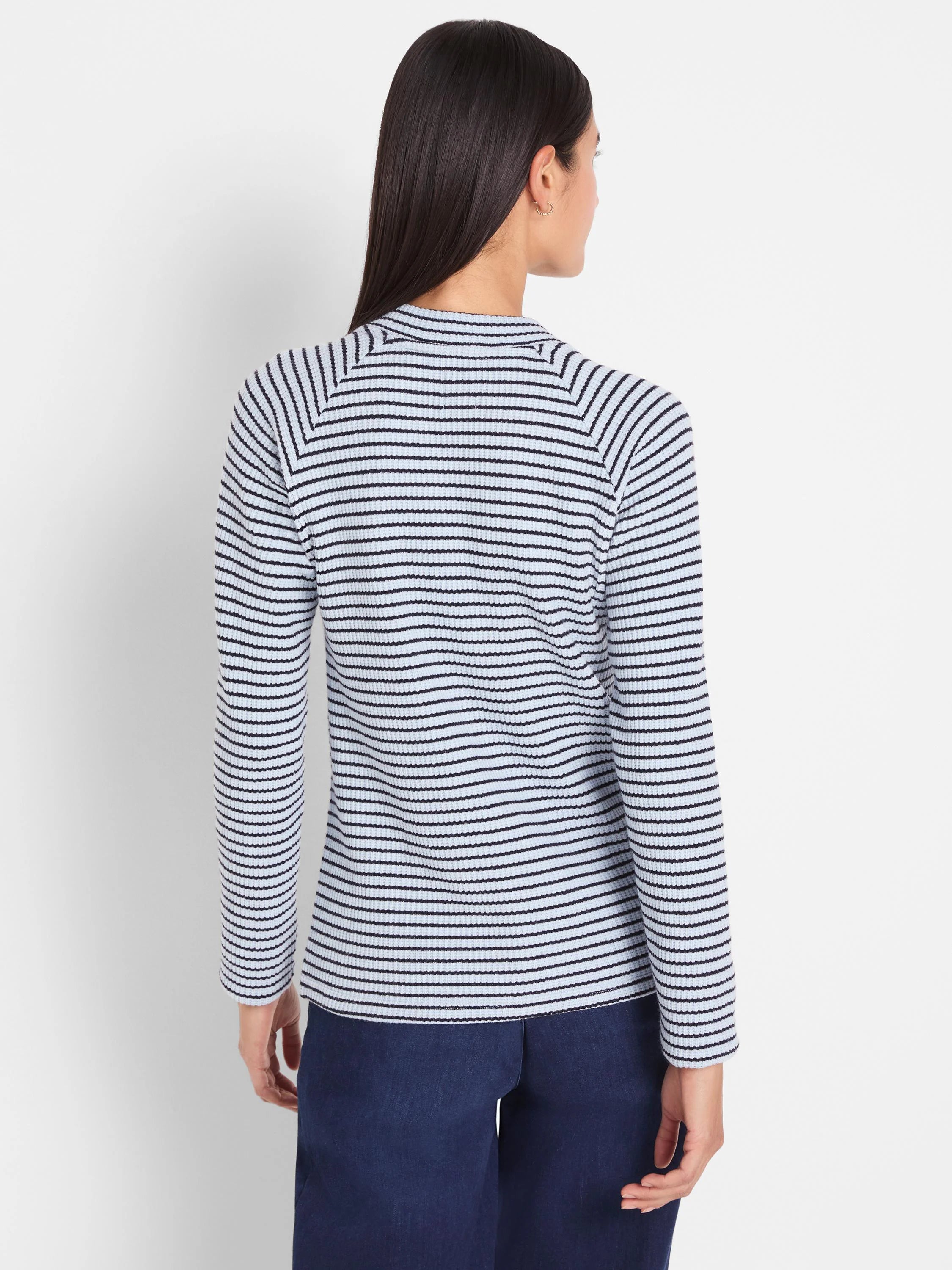 Back view: Thermal top with pale blue and navy horizontal stripes. Ribbed texture, long sleeves. Stripes angle on shoulders.