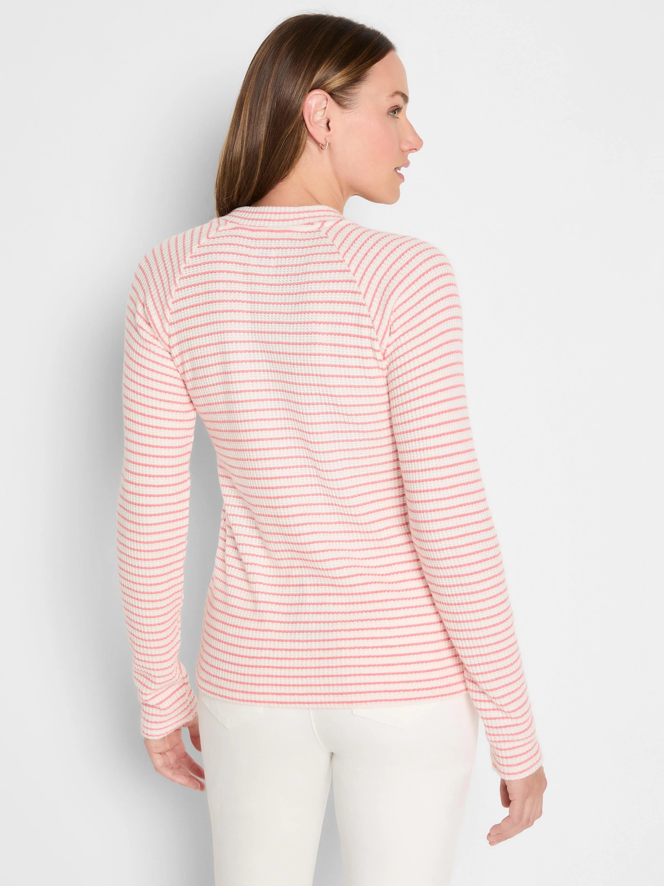 Cream thermal top with thin pink horizontal stripes and long sleeves.