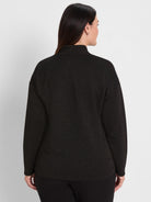 Black mock neck top with horizontal sparkly stripes.