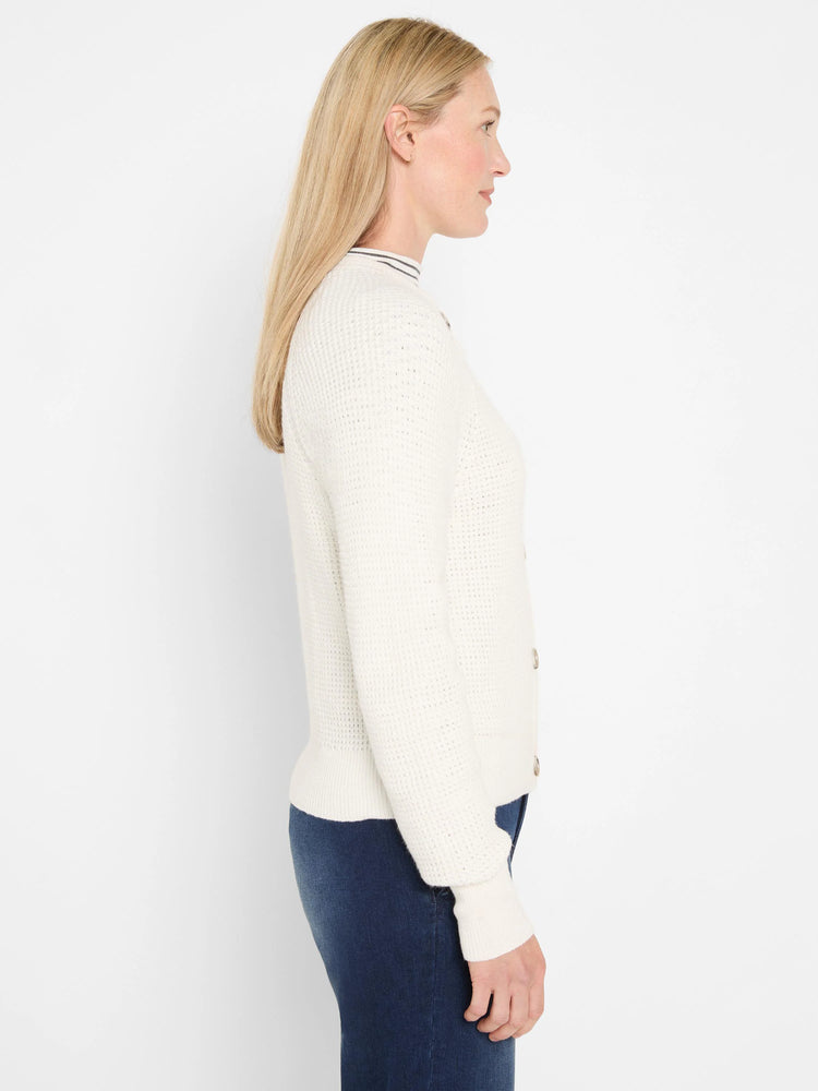 Off-white waffle knit cardigan with a button front and thin striped collar.