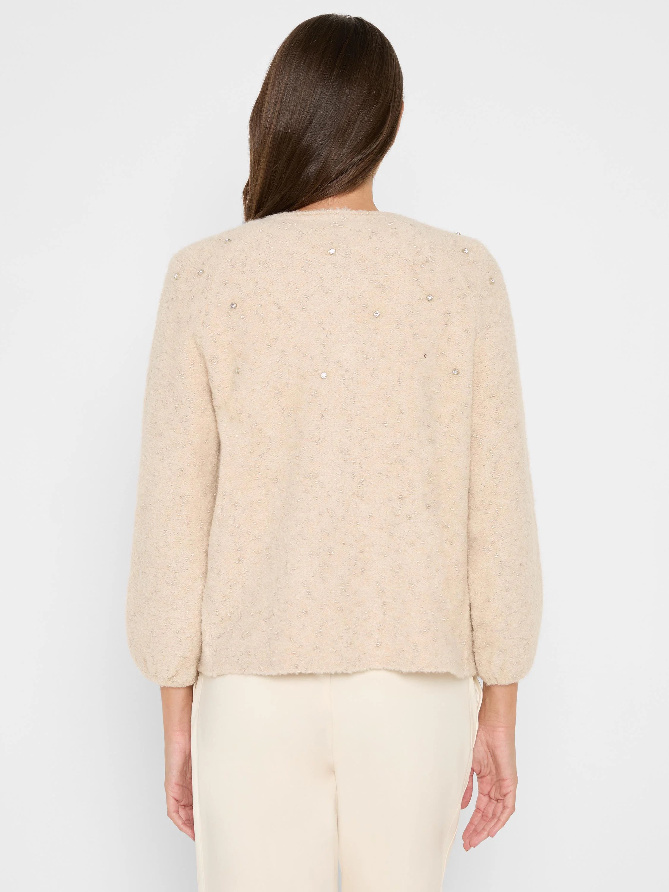 Beige fuzzy knit cardigan with subtle metallic flecks & nubs. Features scattered clear rhinestones on the upper back....
