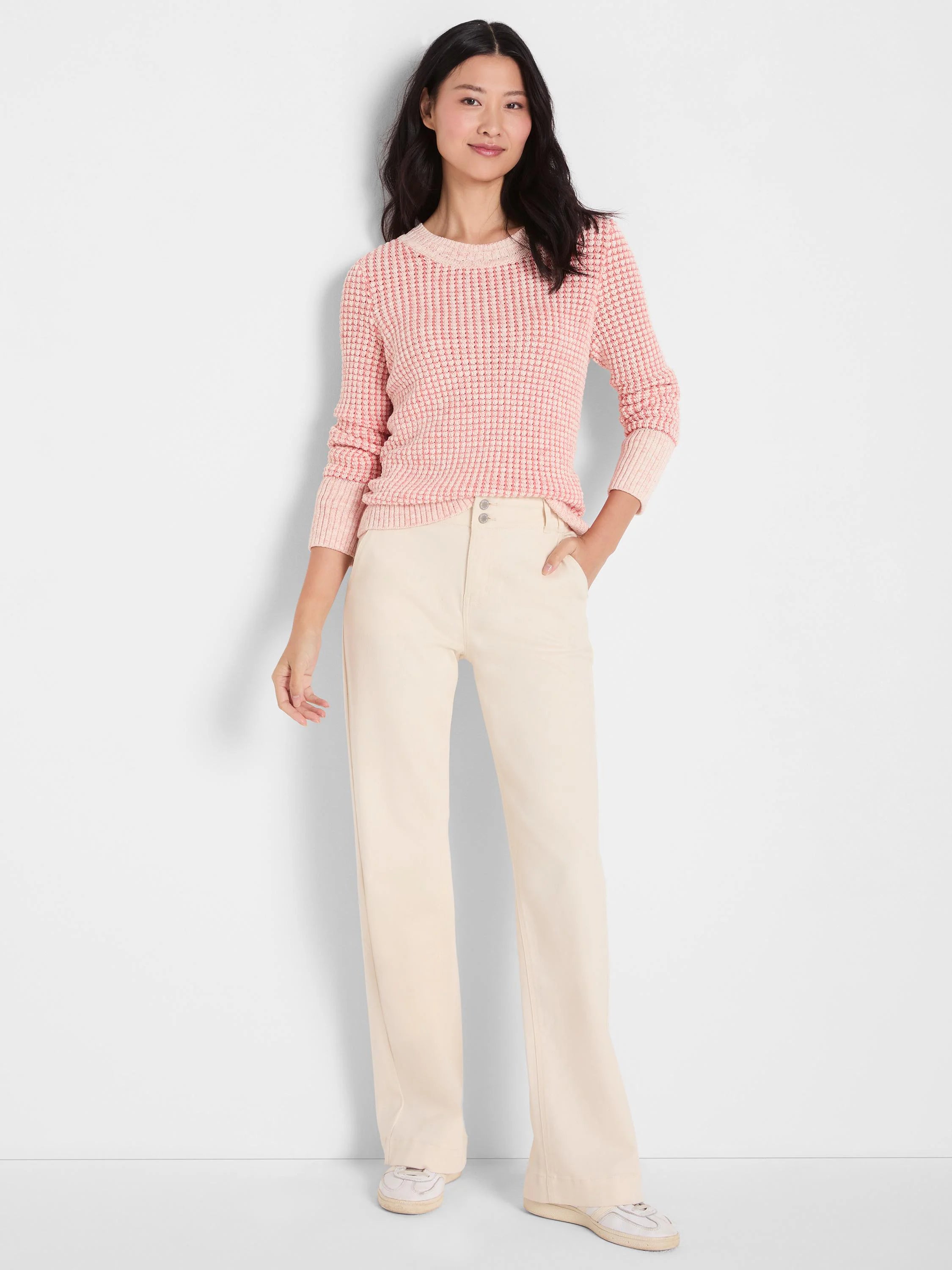 Light pink variegated chunky knit sweater with long sleeves and a crew neck.