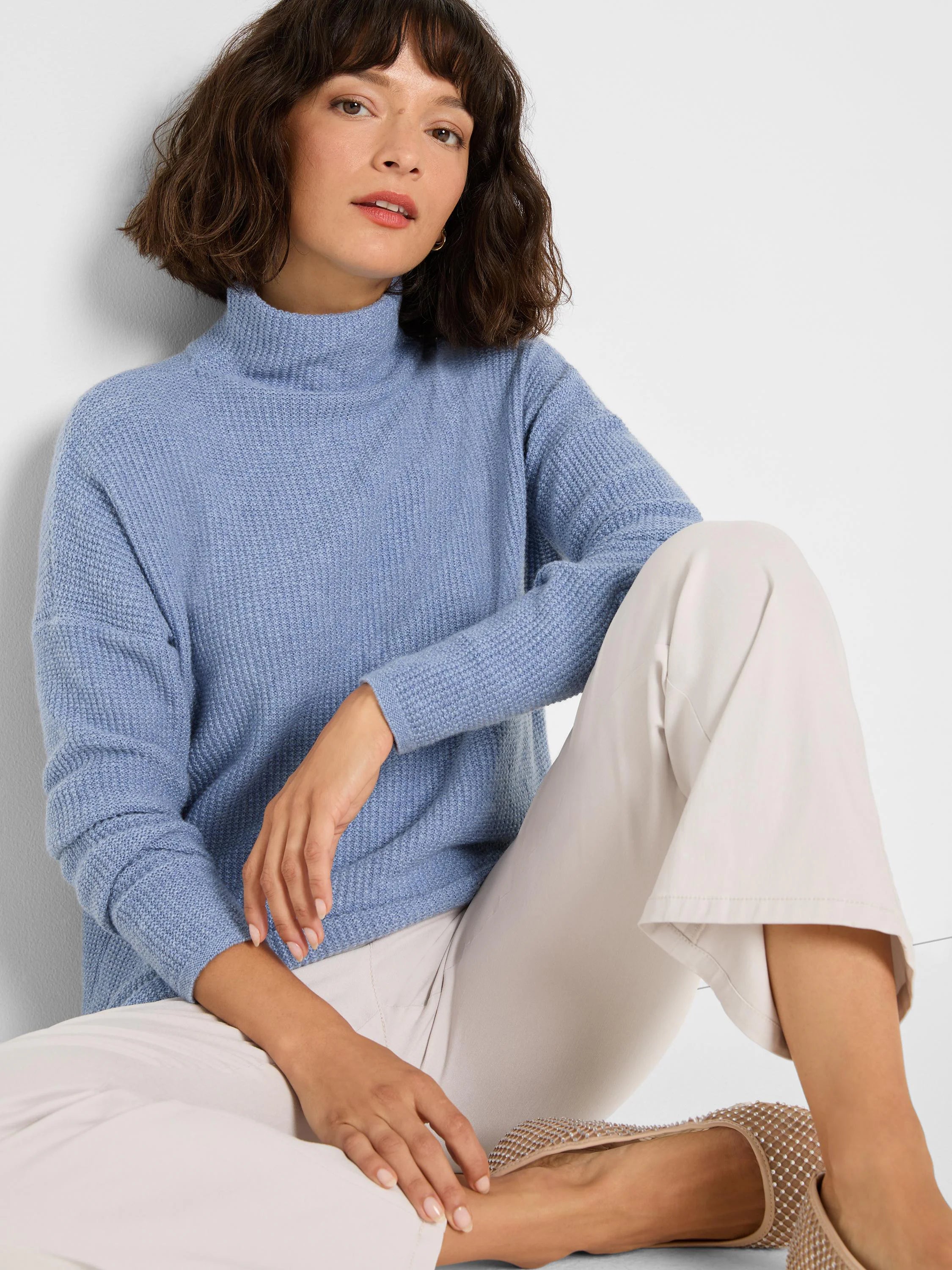 Periwinkle blue waffle knit mock neck sweater.