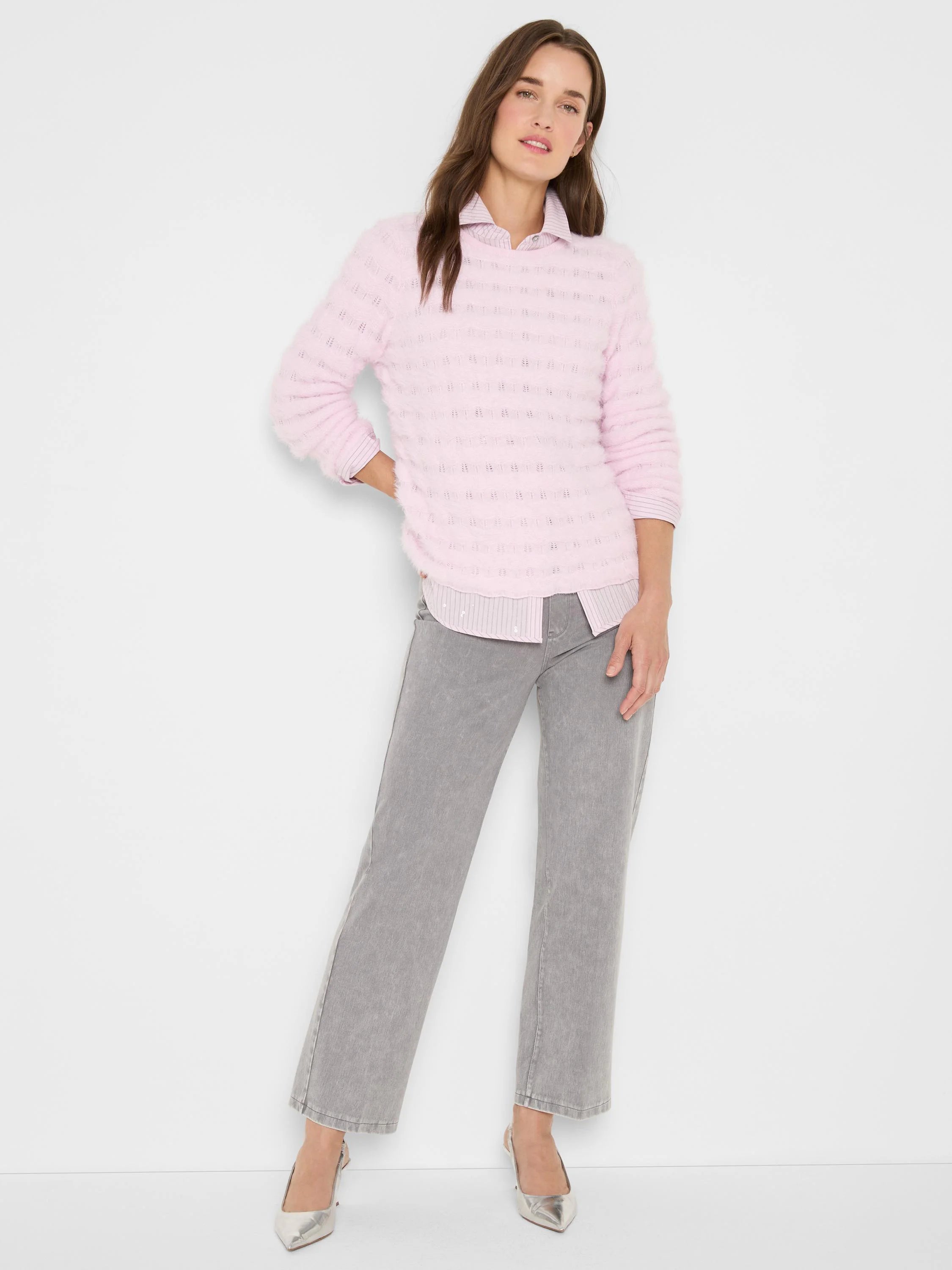 Light pink fuzzy sweater with horizontal rows of raised, wavy knit texture.
