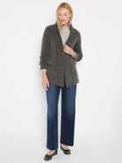 Dark grey brushed doubleknit blazer with notched lapels, two front buttons, and flap pockets.