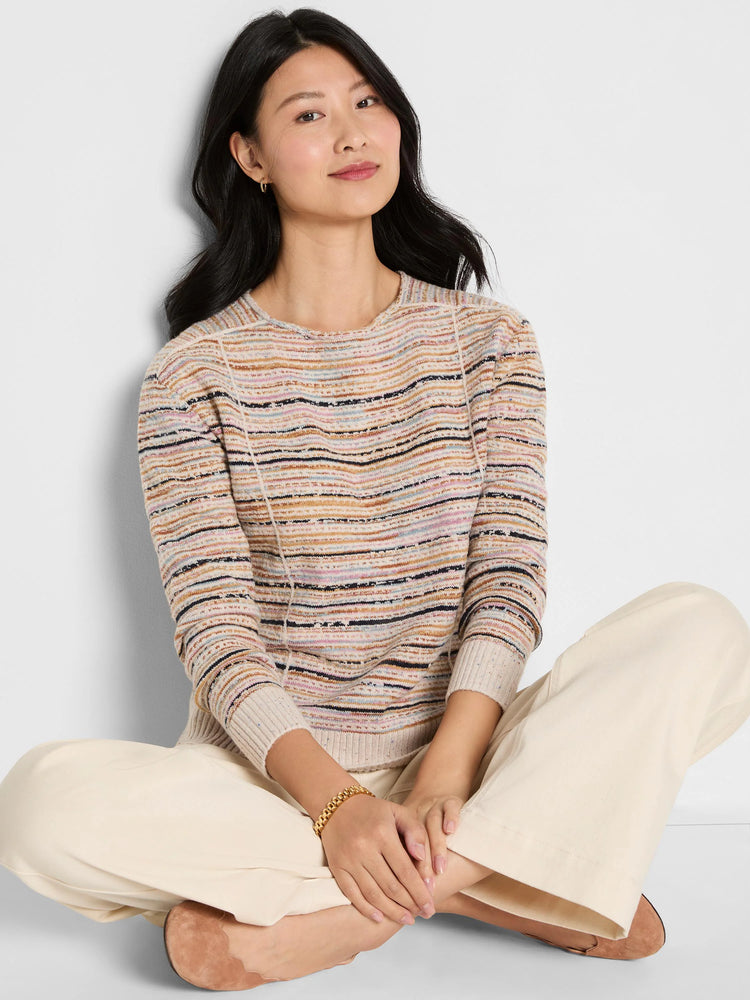 Mirage Seamed Sweater: Beige, textured knit with horizontal stripes in blue, pink, brown. Features prominent vertical seams.
