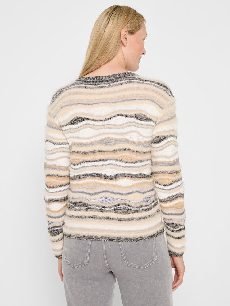 Wavy striped knit sweater in cream, beige, light gray, and dark gray, with a fuzzy texture.