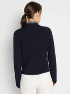 Dark navy knit bomber jacket with a mock neck and long sleeves, shown from the back.