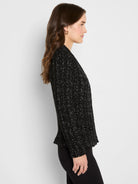 Black knit jacket with silver metallic flecks, a textured weave, and a collarless design.