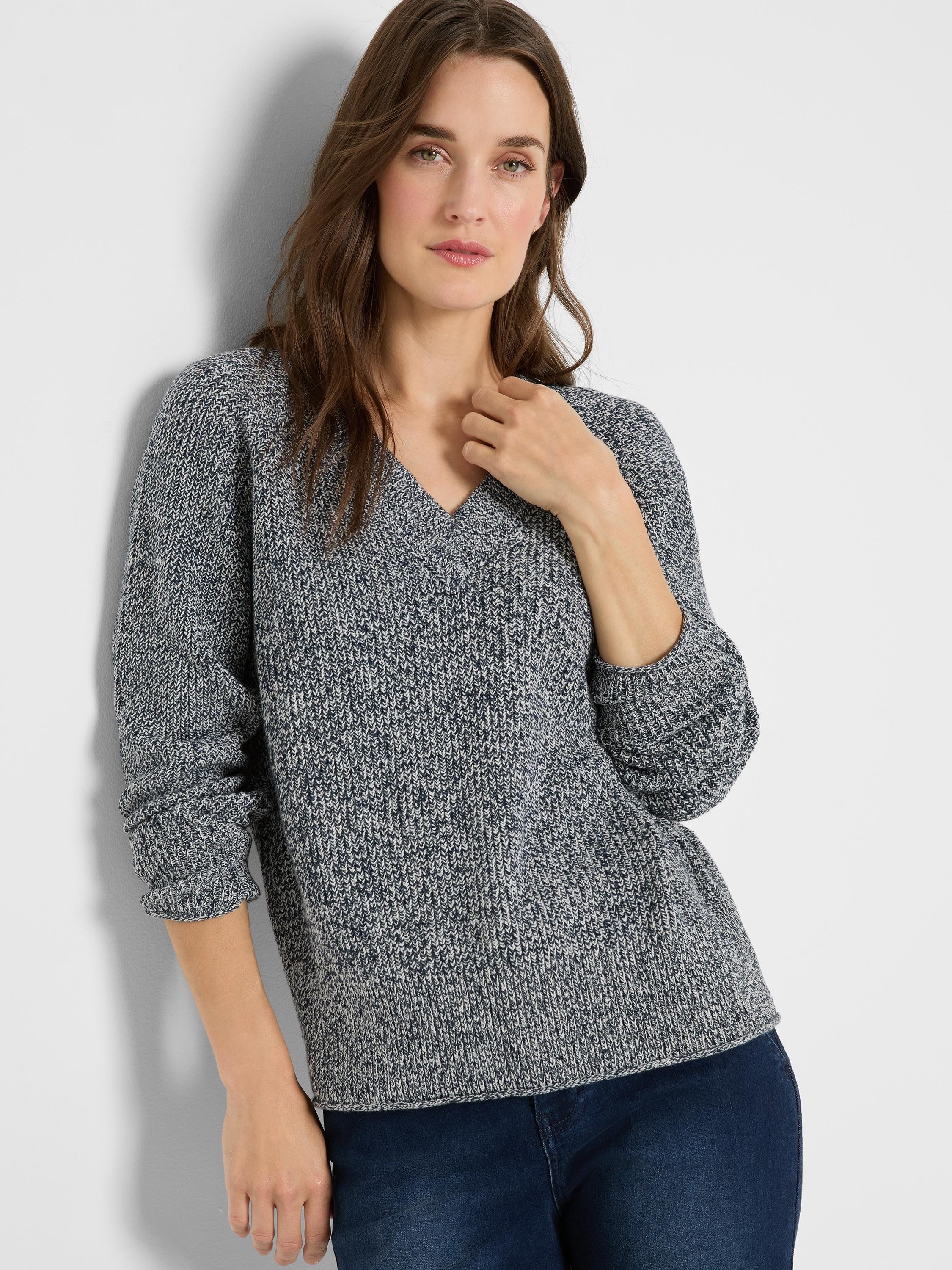 Marled indigo & white V-neck shaker knit sweater with a chunky texture and cuffed sleeves.