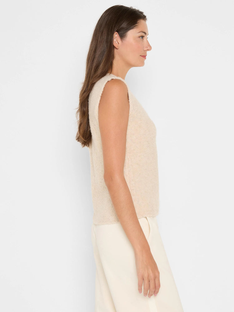 Cream sleeveless tank with a fuzzy texture, featuring subtle metallic threads and small flecks.