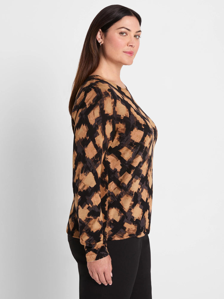 Tan, black, & dark gray abstract check sweater with long sleeves & a crew neck.