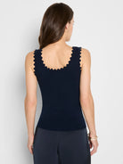 Dark navy ribbed sweater tank with scalloped neckline and armholes.