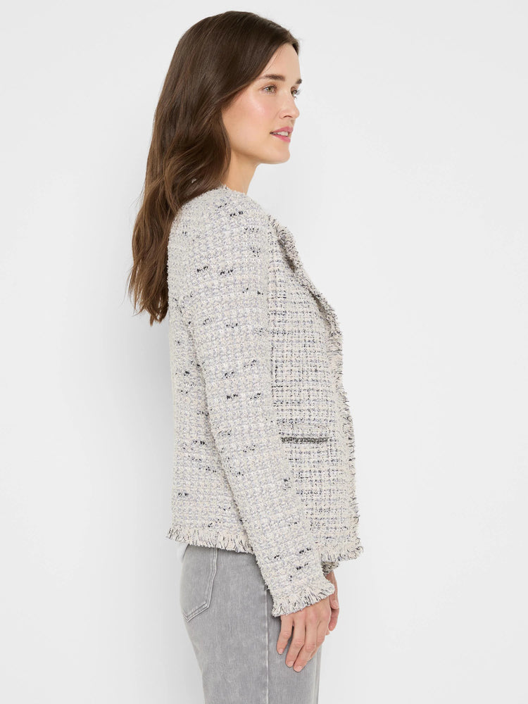 Off-white mix knit jacket with pale blue, black flecks, fringe edges, & silver chain trim.