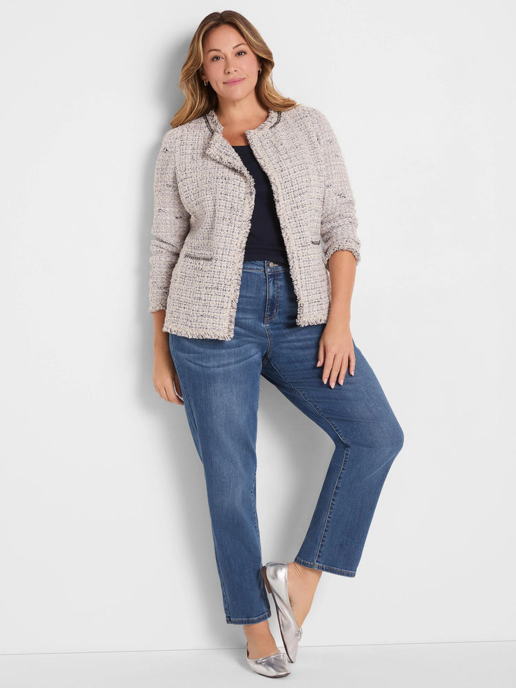 Pale multi-color tweed jacket, collarless, with dark chain trim and frayed edges.