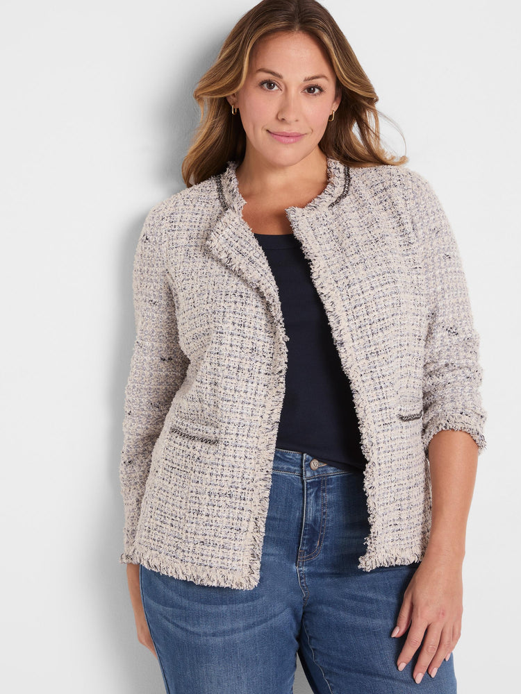 Cream mixed knit jacket with blue/grey flecks, dark chain trim, and fringed edges.