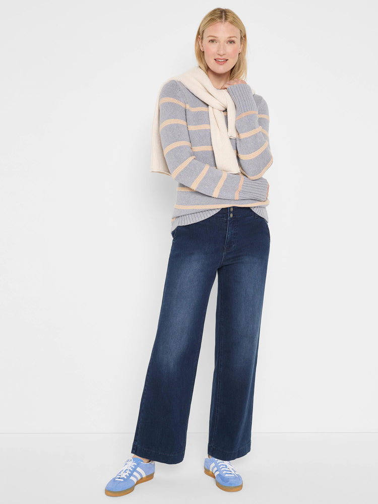 Light grey knit sweater with evenly spaced, horizontal peach stripes.