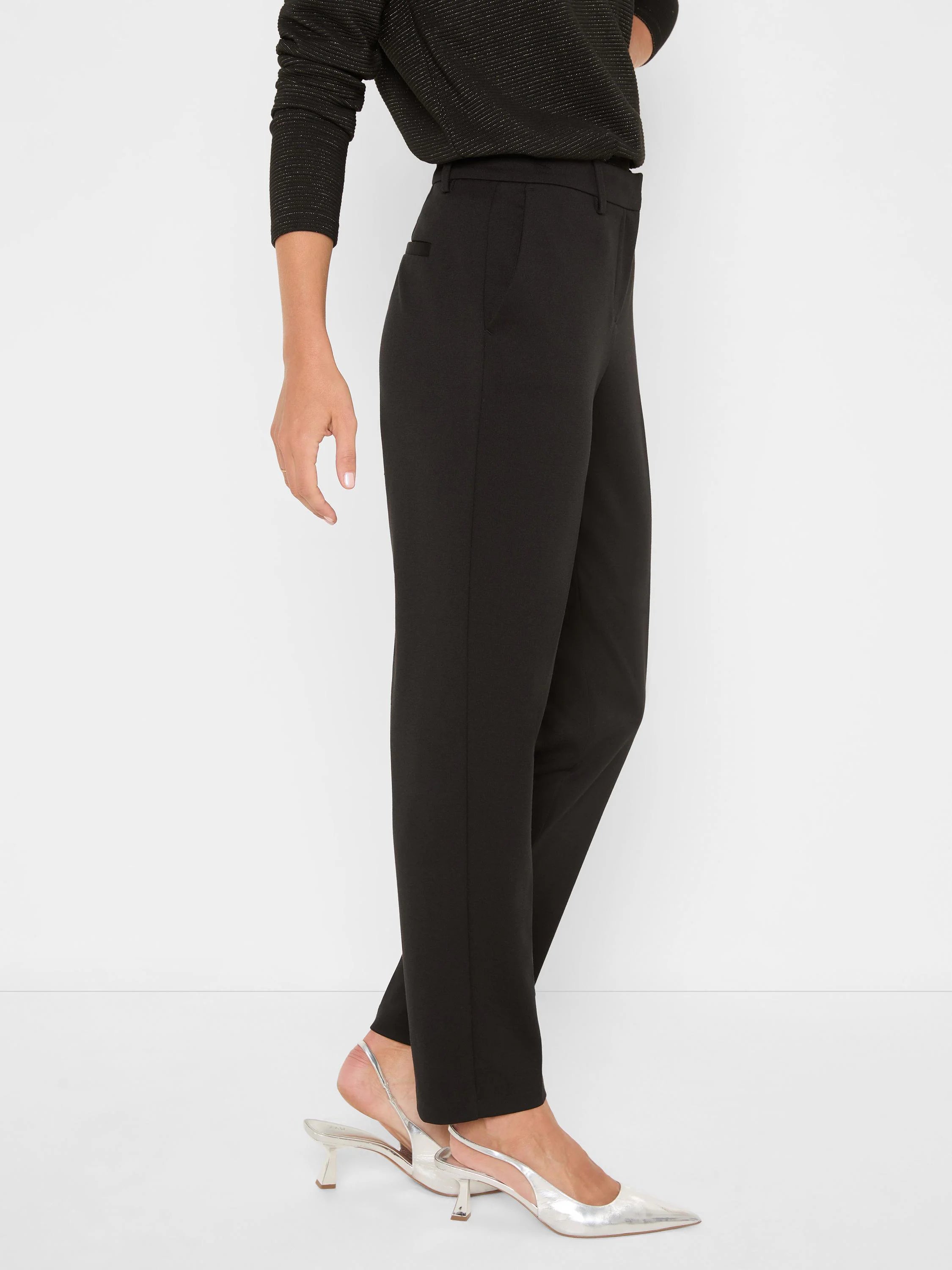 Black ponte knit trousers, high-waisted with belt loops, straight leg, and a subtle front crease.