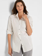 Light beige shirt with thin grey vertical stripes and scattered small silver sequins.