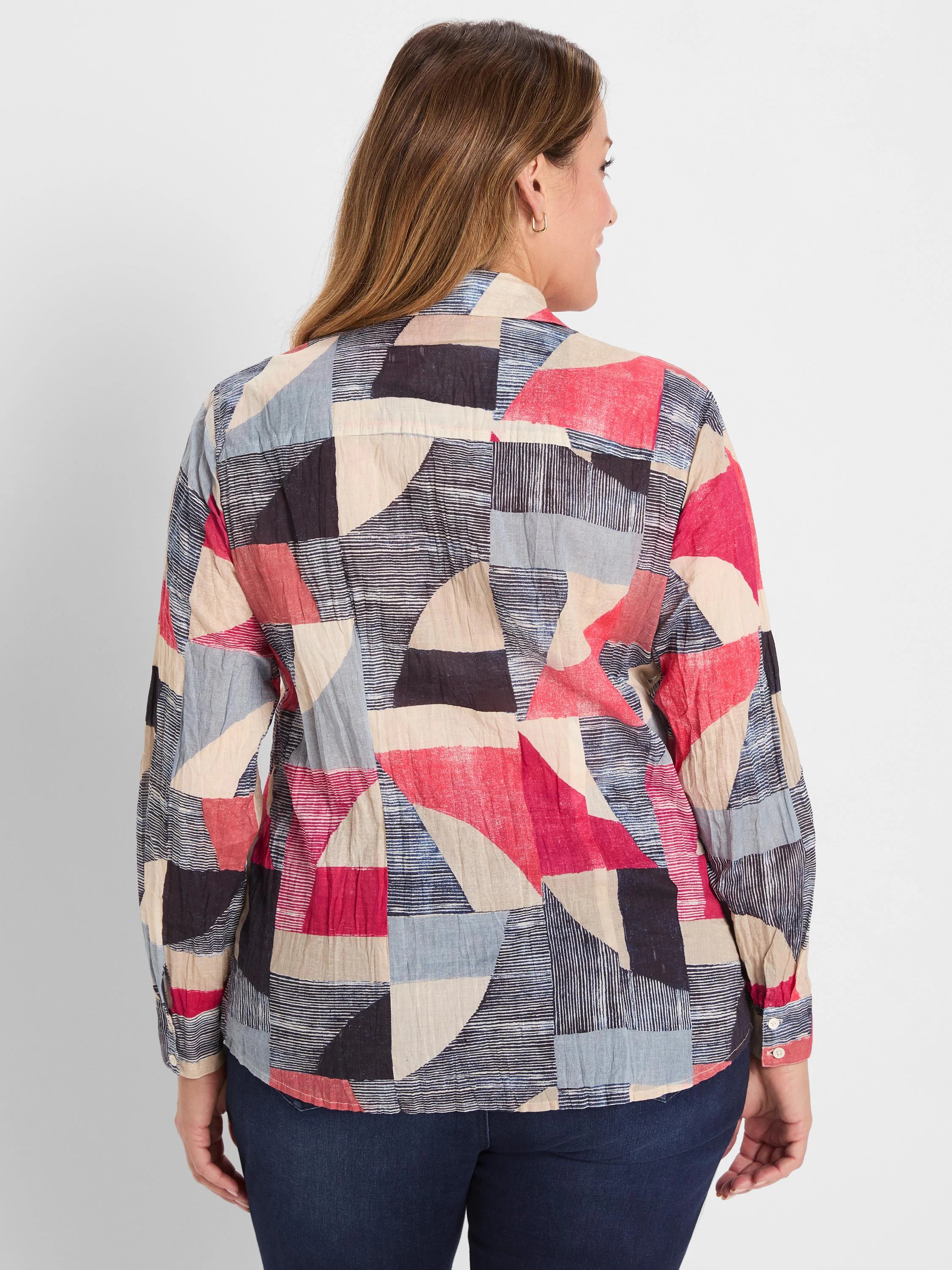 Crinkle shirt with a geometric pattern in red, beige, blue, and black blocks, some with fine stripes.