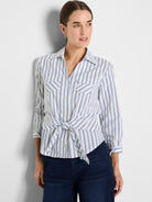 A tie-front button-down shirt in white with blue stripes features flap pockets and a cinched fit.