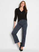 Straight ankle jeans with dark blue background and black leopard print.