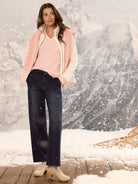 Deep blue, dark wash wide-leg trouser jeans worn by a model. They have a relaxed, full-length cut, seen over light clogs.