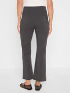Charcoal bootcut pants, cropped length. Two back patch pockets with visible stitching.