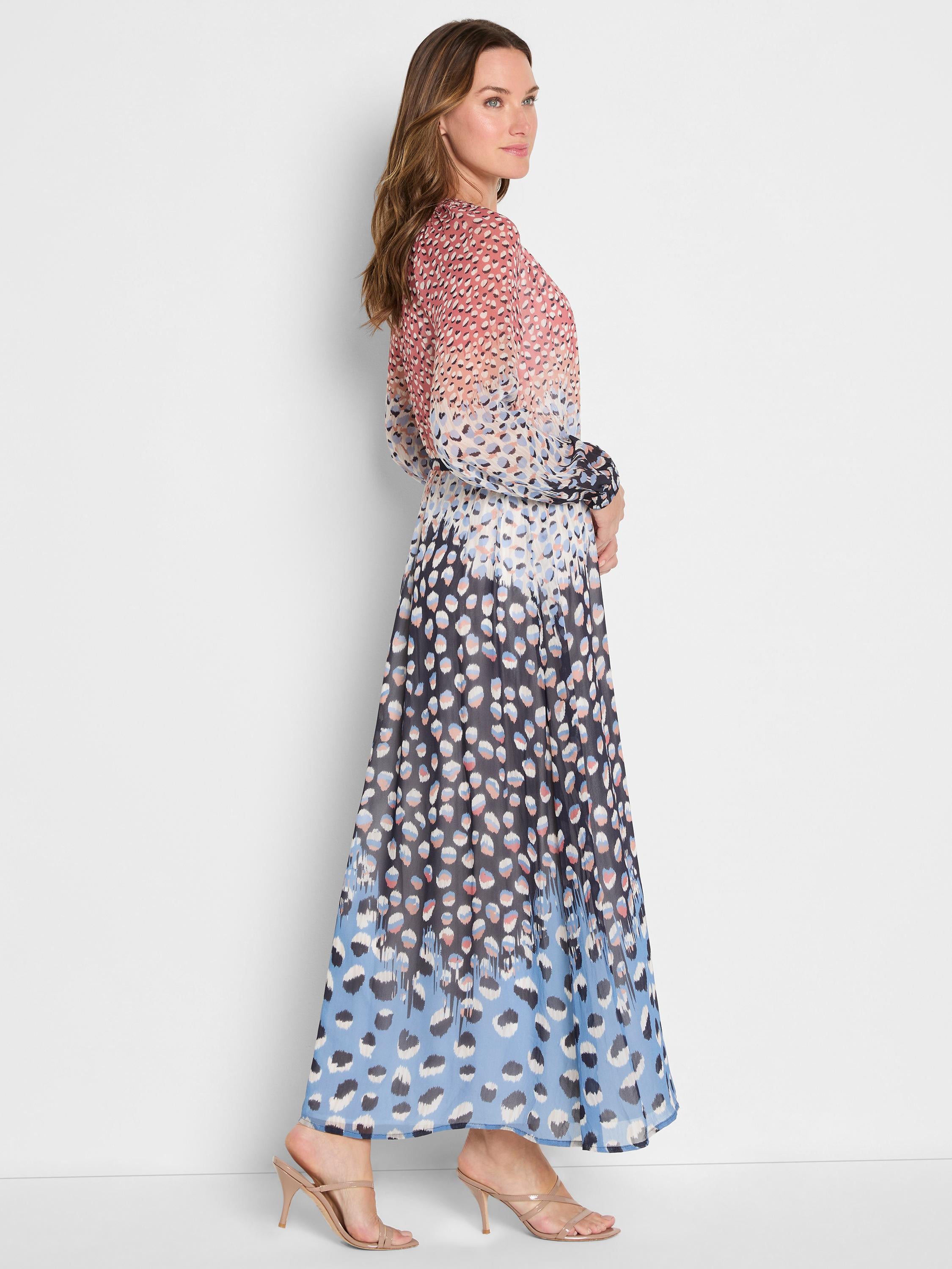 Flowy long-sleeve maxi dress in a multicolored sheer spotted print with a coral-to-blue gradient design.