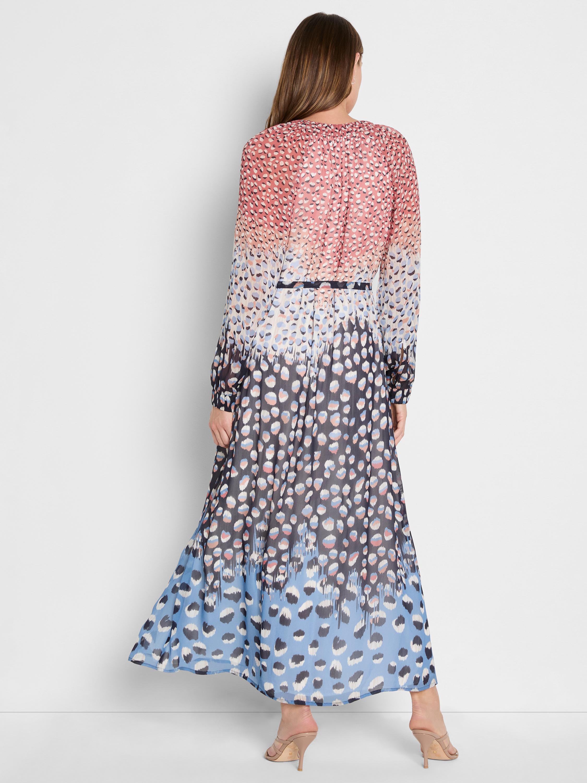 This flowy, long-sleeve maxi dress features a multicolored ombre abstract spot print and a cinched waist.