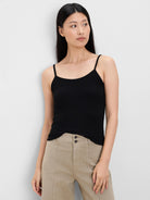 Black rib knit cami with thin spaghetti straps.