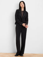 Black sheer top with scattered velveteen dots.