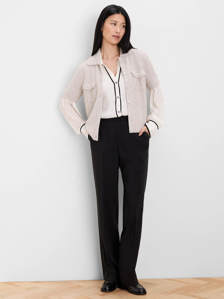 Textured light beige short-sleeve cardigan with subtle sparkle, collar, front buttons, and two chest flap pockets.