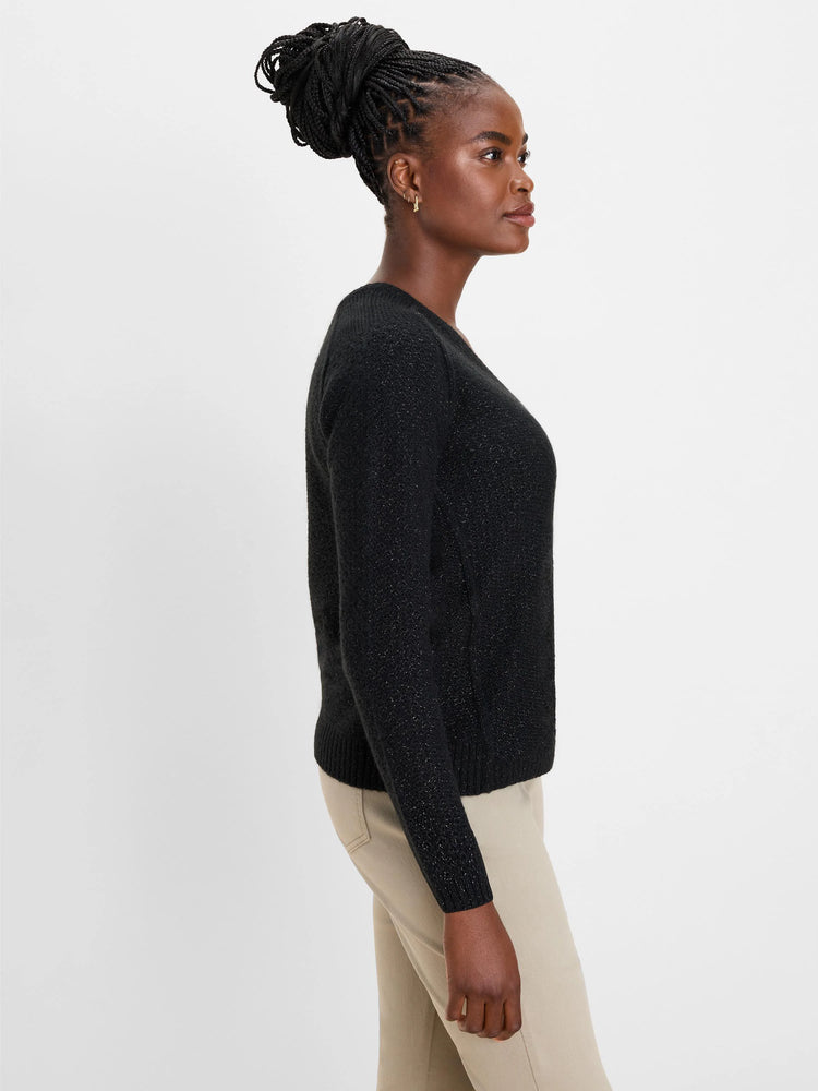 Black V-neck sweater with a subtle silver sparkle knit texture.