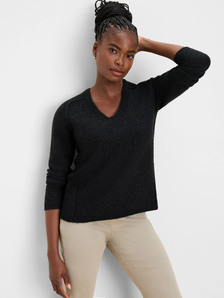 Black V-neck sweater with a subtle silver shimmer and 3/4 length sleeves.